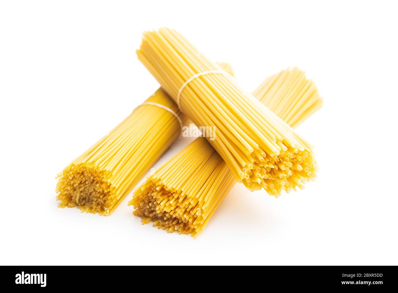 Raw spaghetti pasta isolated on white background. Stock Photo