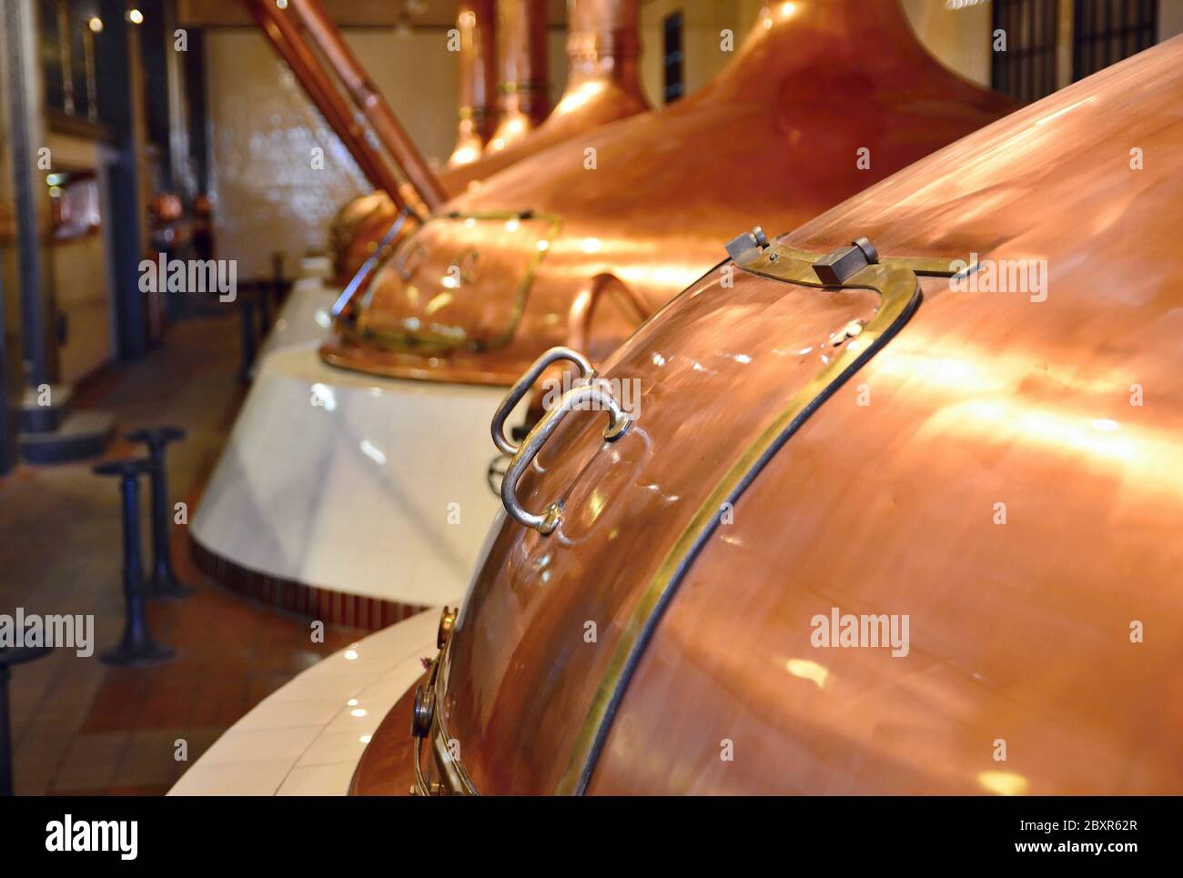 View of beer brewery interior with traditional fermenting copper vats Stock Photo Alamy