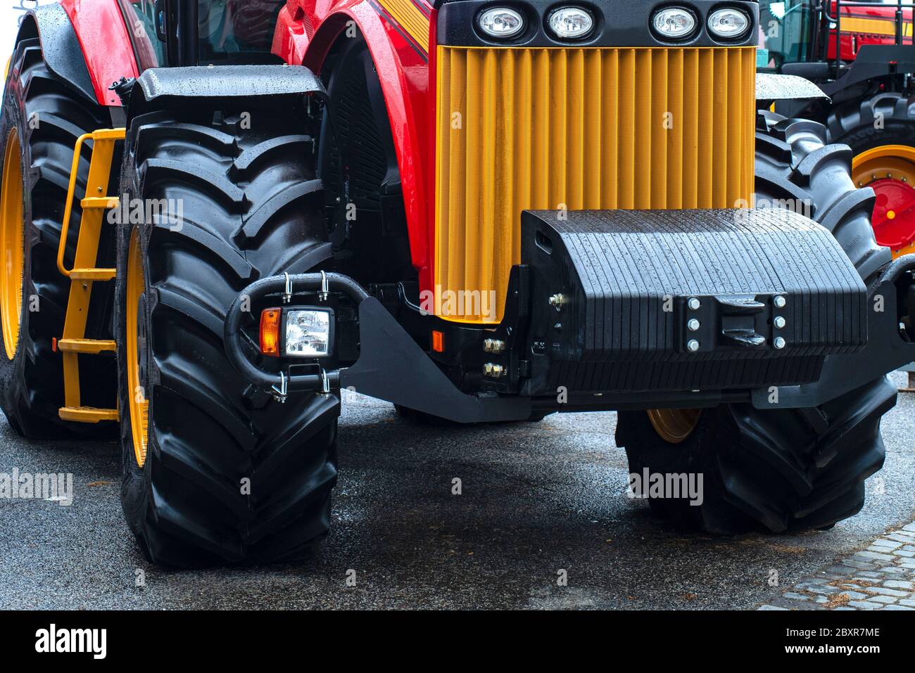 Red tractor.Elements of a red tractor, combine harvester close-up.New red tractor Stock Photo