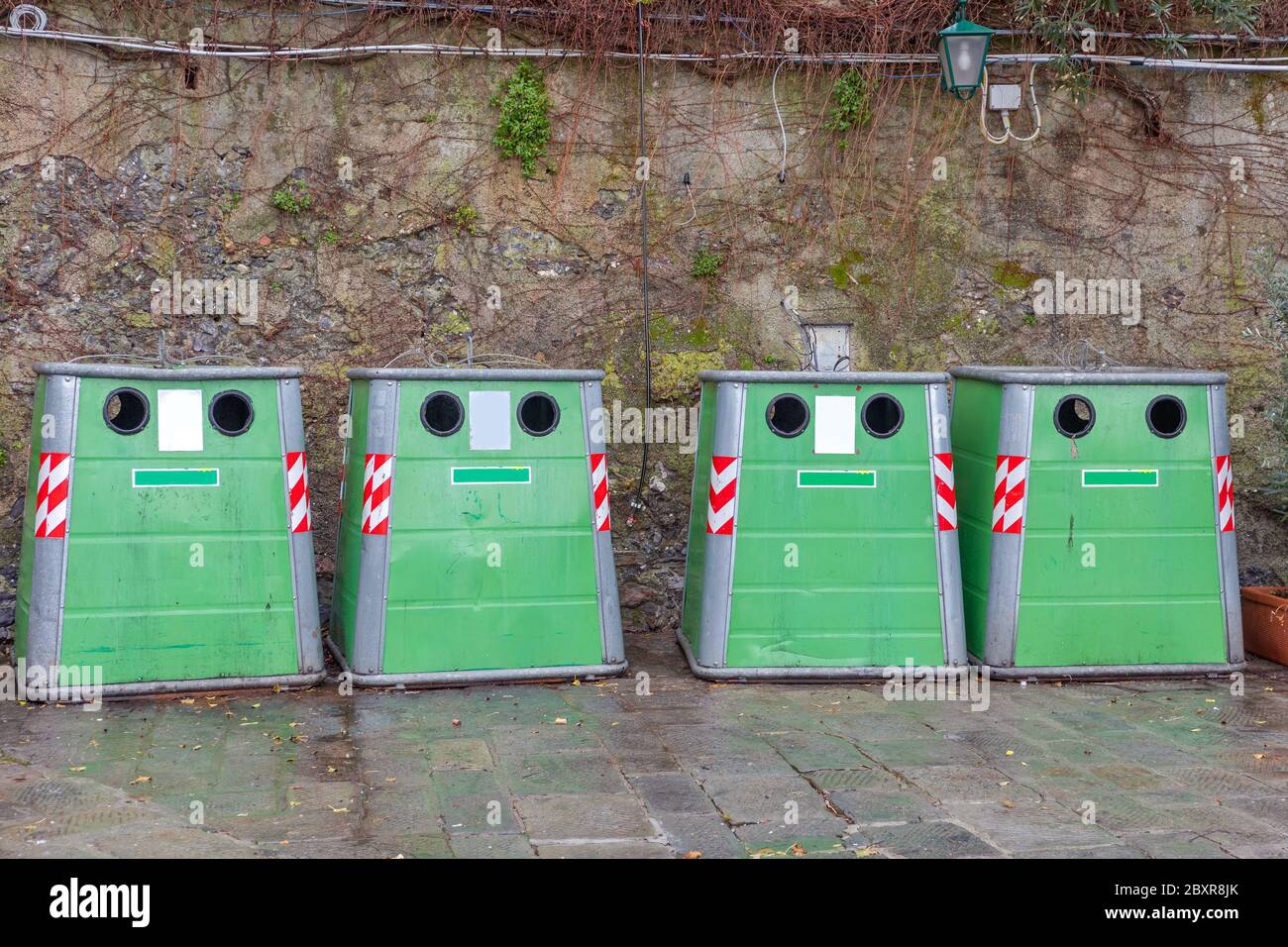 Four Collection Green Recycling Bins For Glass Stock Photo Alamy