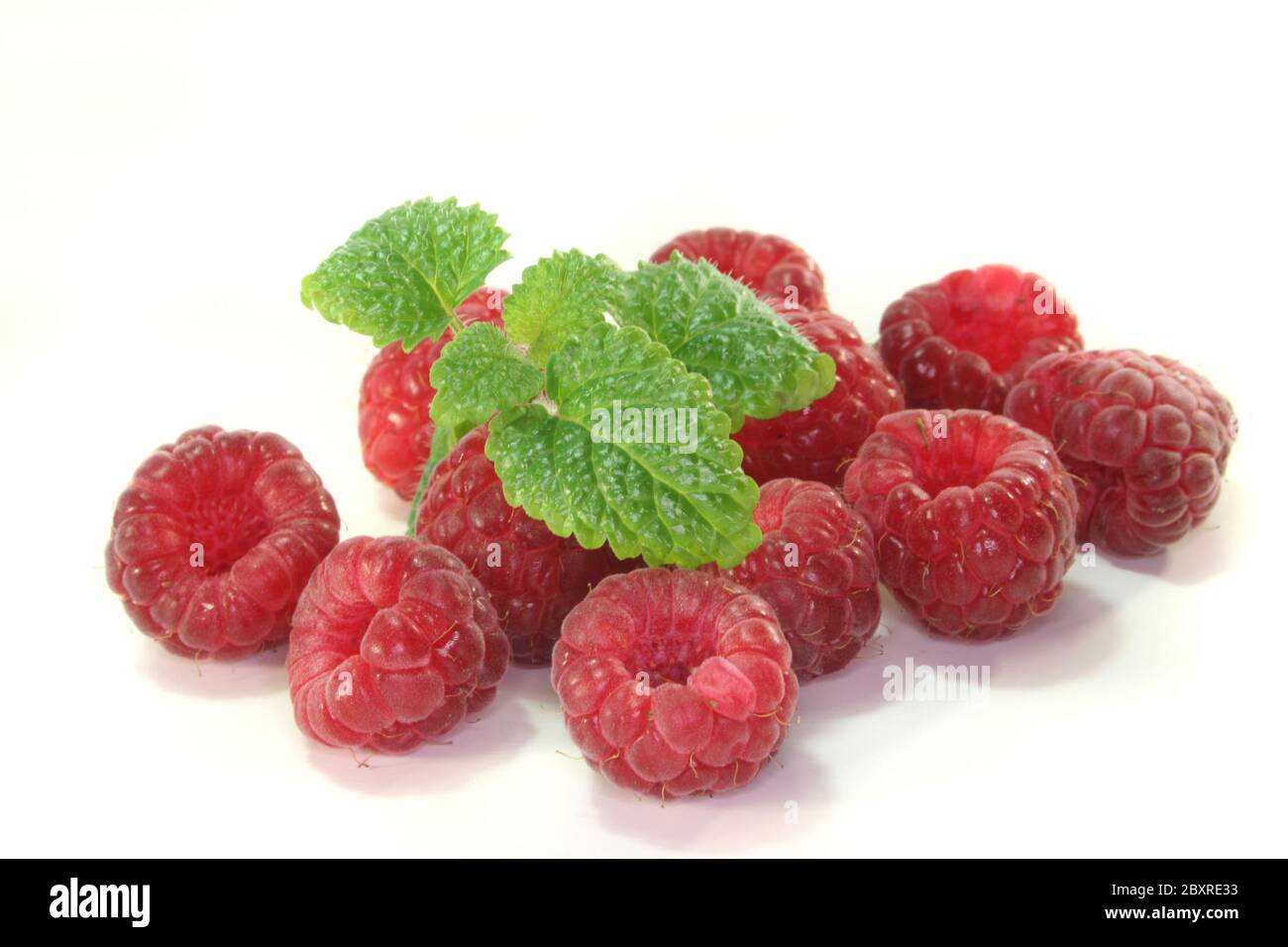 Lemon Raspberry Fruit raspberry with lemon balm Stock Photo - Alamy