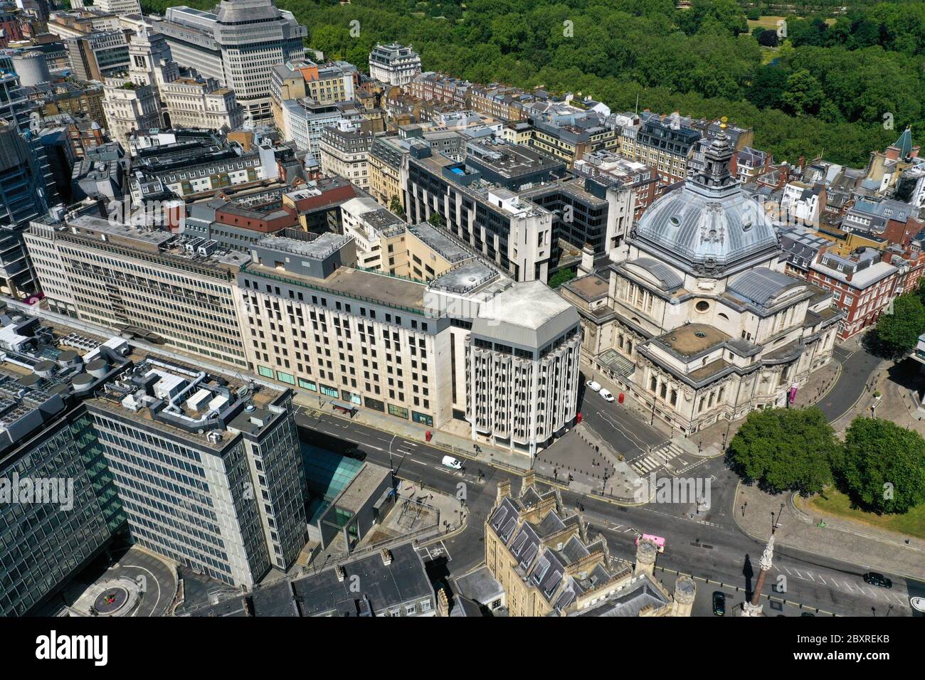 An aerial view of London, at the junction of Victoria Street and Tothill Street, showing Westminster Abbey (bottom left), the Crimea and Indian Mutiny memorial, the department for Education (top left), Barclays Bank (centre) and Methodist Central Hall on Storey's Gate (right). Stock Photo