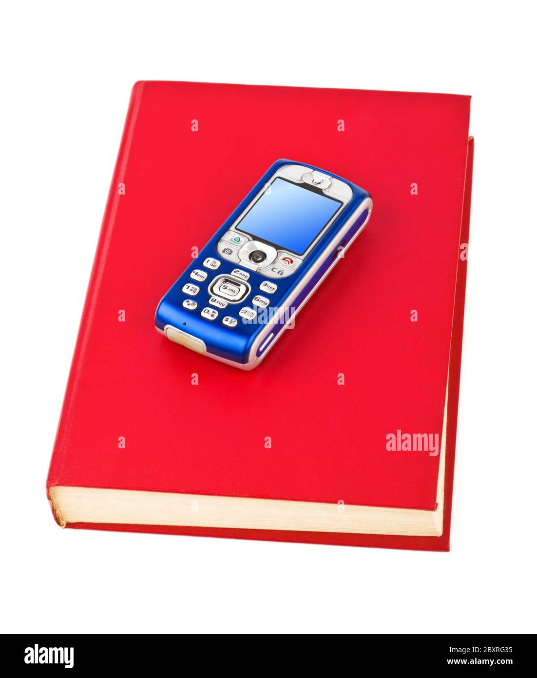 Mobile phone on book Stock Photo Alamy
