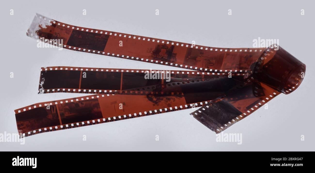 Photographic film strips or reel isolated in light grey background