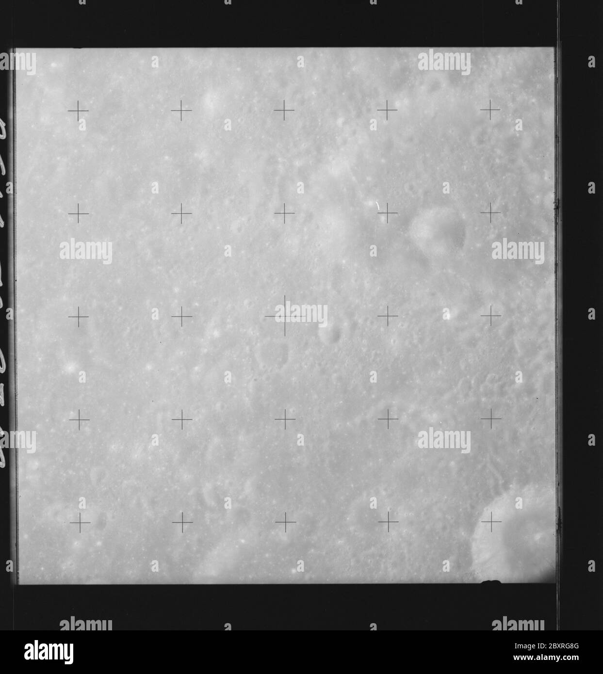 AS14-70-9712 - Apollo 14 - Apollo 14 Mission image - View of the lunar surface west of the Ansgarius Crater and south of the Smythii Sea.; Scope and content:  The original database describes this as: Description: View of the lunar surface west of the Ansgarius Crater and south of the Smythii Sea (Mare Smythii). Images were taken on Revolution 26 of the Apollo 14 mission. Original film magazine was labeled Q,film type was 3400BW (Panatomic-X,Black and White),80mm lens with a sun elevation of 56 degrees. Approximate Photo Scale was 1:1,380,000. Principal Point Lattitude was 11.0S by Longitude 85 Stock Photo