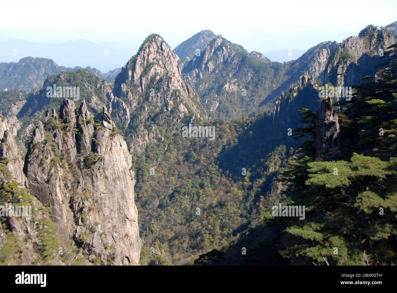 Huangshan Mountain in Anhui Province, China. A beautiful panoramic mountain view of the rocky peaks of Huangshan at White Goose Ridge Stock Photo