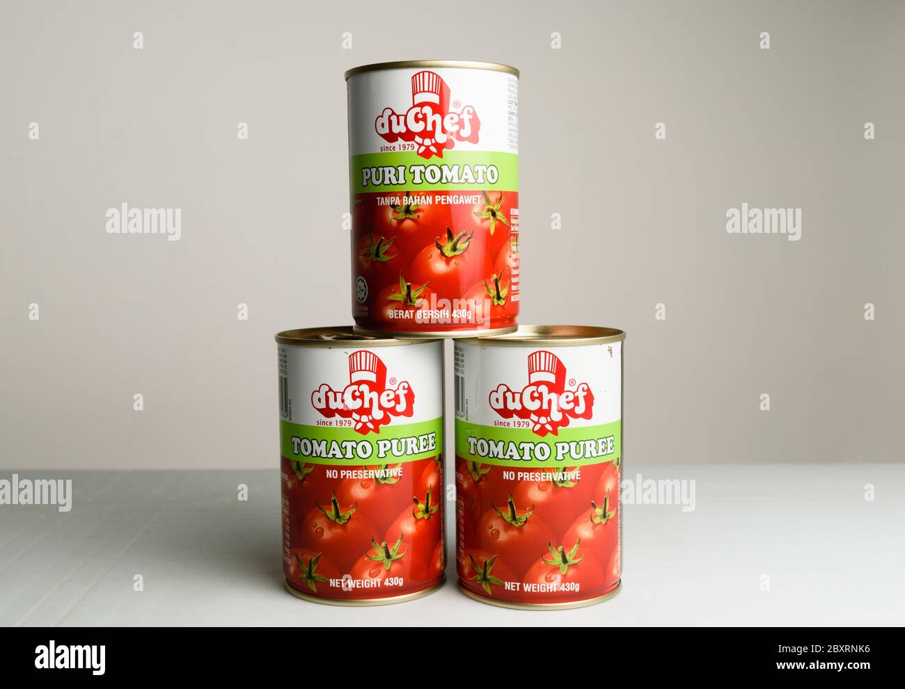 Kuching Sarawak Malaysia April 26 2020 Tomato Puree In Can Stacked In Three Under Brand Of Duchef On Grey Background Stock Photo Alamy