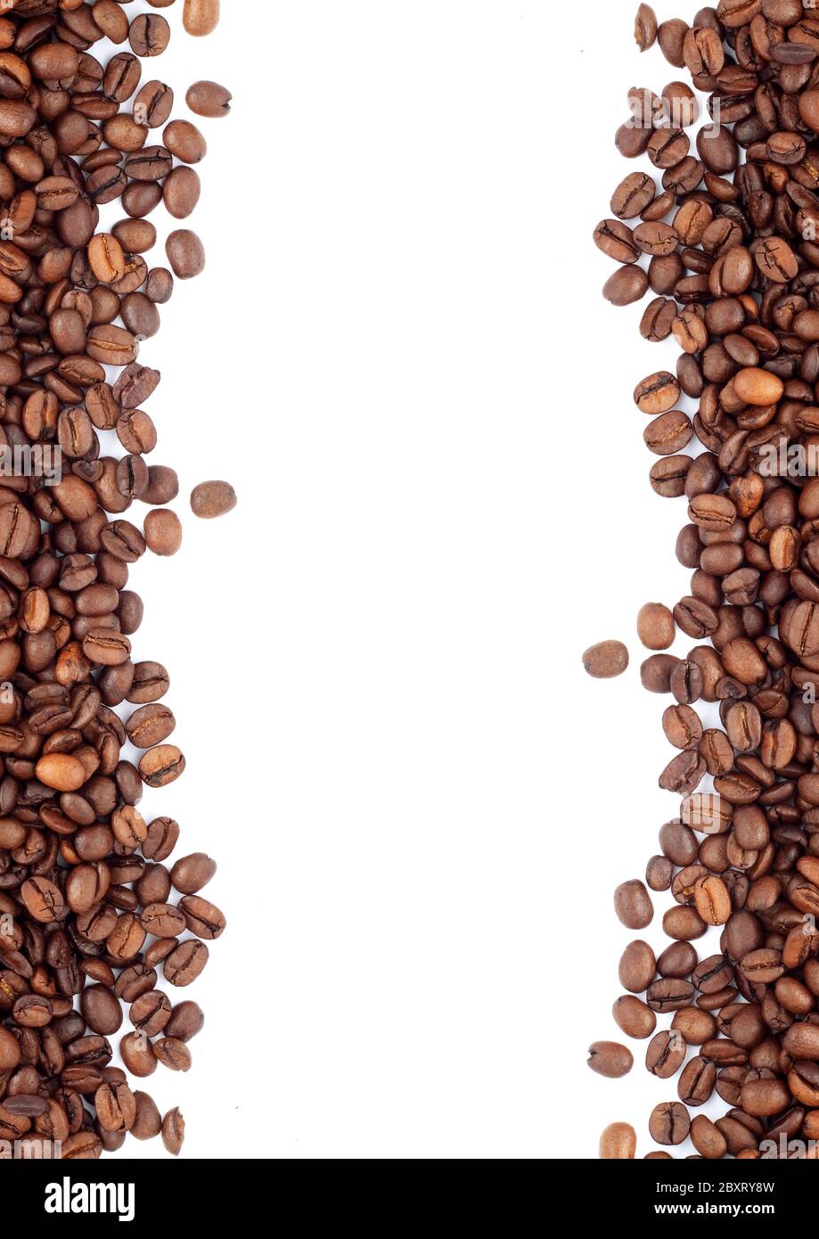 Brown roasted coffee beans isolated on white background Stock Photo - Alamy