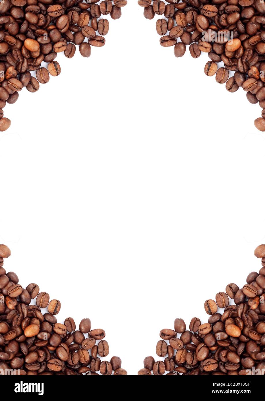 Brown roasted coffee beans isolated on white background Stock Photo - Alamy
