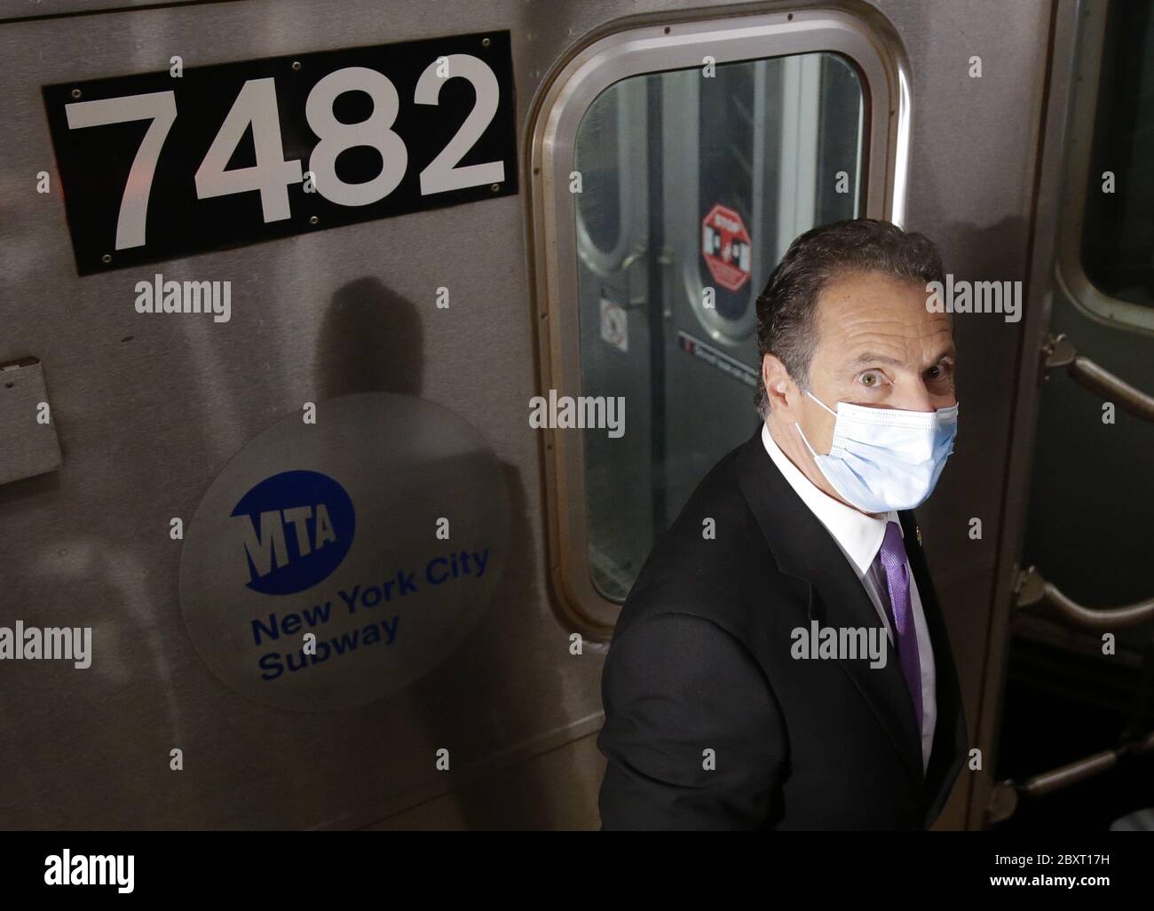 New York, United States. 08th June, 2020. New York Governor Andrew M. Cuomo gets off of a MTA subway car wearing a face mask when he arrives at Grand Central Station to attend a near by press conference in New York City on Monday, June 8, 2020. New York City today enters phase 1 of a four-part reopening plan. The city has been under a stay-at-home order due to the Coronavirus pandemic since March 22nd. Photo by John Angelillo/UPI Credit: UPI/Alamy Live News Stock Photo