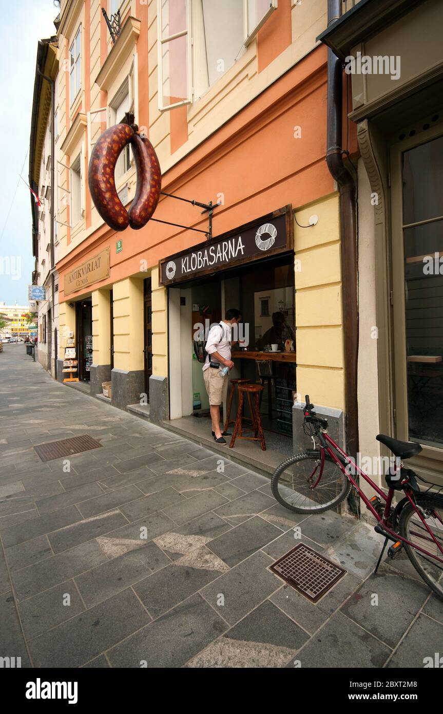 Typical Carniolan sausage for sale at Klobasarna restaurant in  Ljubljana, Slovenia Stock Photo