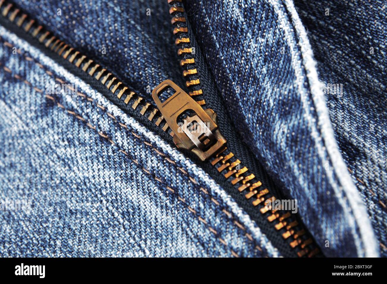 Zipper zip denim jeans background hi-res stock photography and