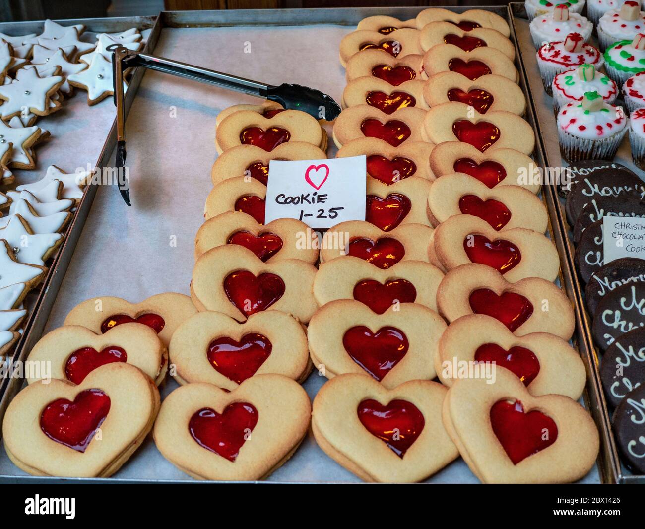 CHRISTMAS COOKIES JAM HEARTS BISCUITS STALL Heart shaped 'Love'  cookies on sale at Borough Market a popular produce retail market Southwark London Stock Photo