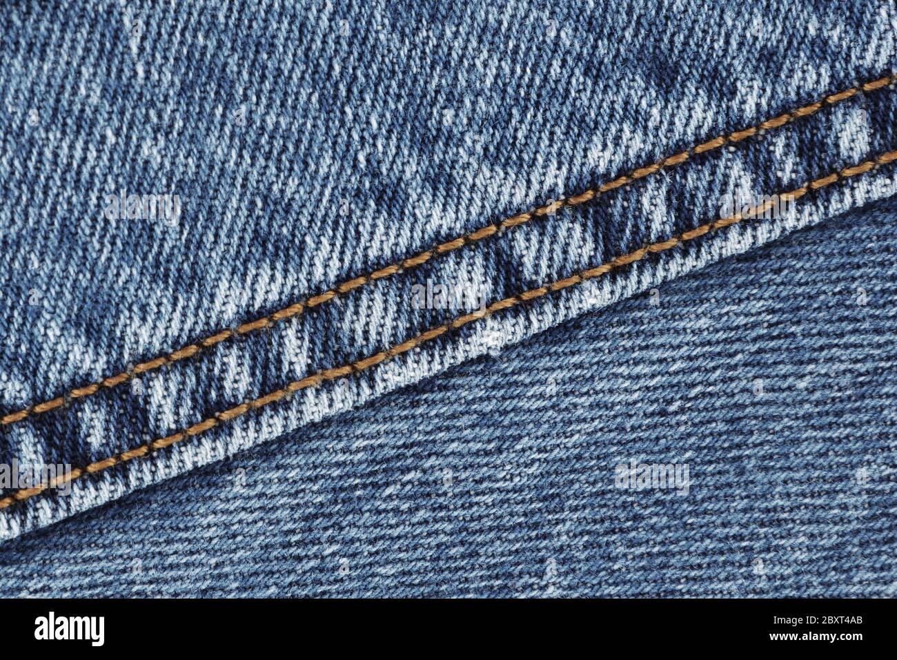 Denim jeans seam double stitch close up blue Stock Photo
