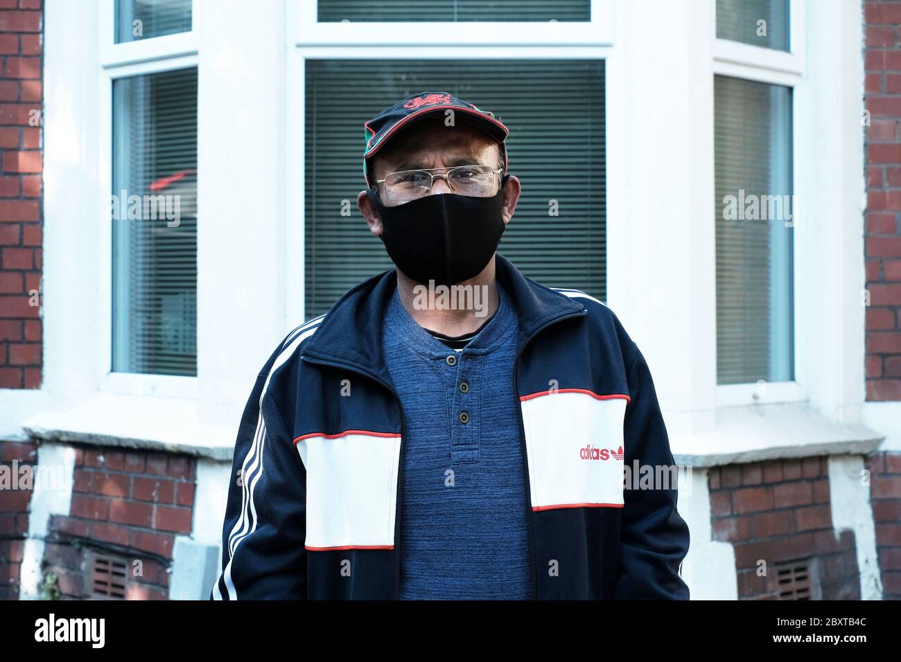 Public wearing a mask in Cardiff during the coronavirus pandemic 2020 Stock Photo