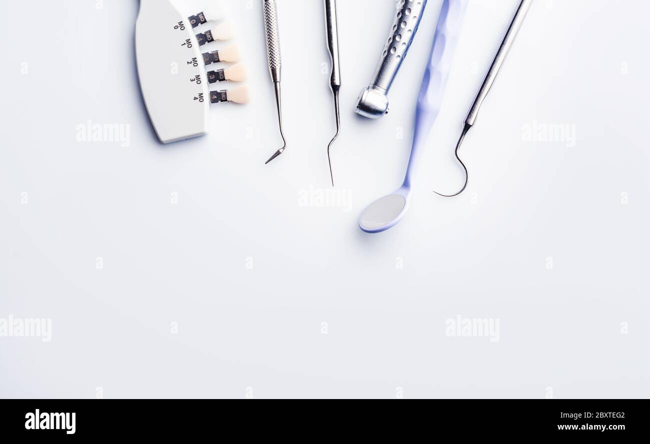 dental tools on white background with copy space Stock Photo