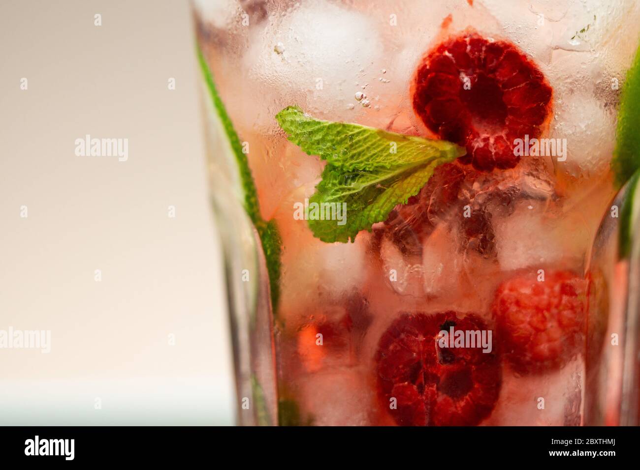 Raspberry mojito cocktail. Close up, copy space Stock Photo