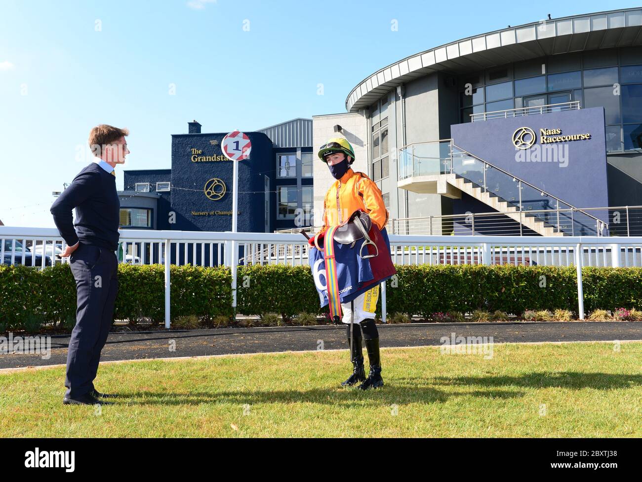 Trainer Denis Hogan and jockey Joey Sheridan after Sceptical wins the Anglesey Lodge Equine Hospital Woodlands Stakes at Naas Racecourse, Co. Kildare, Ireland. Stock Photo