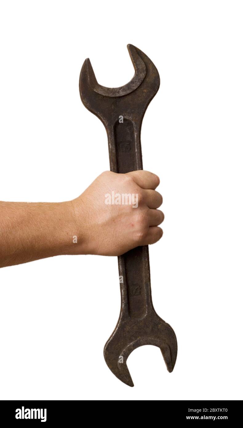 wrench in a hand Stock Photo