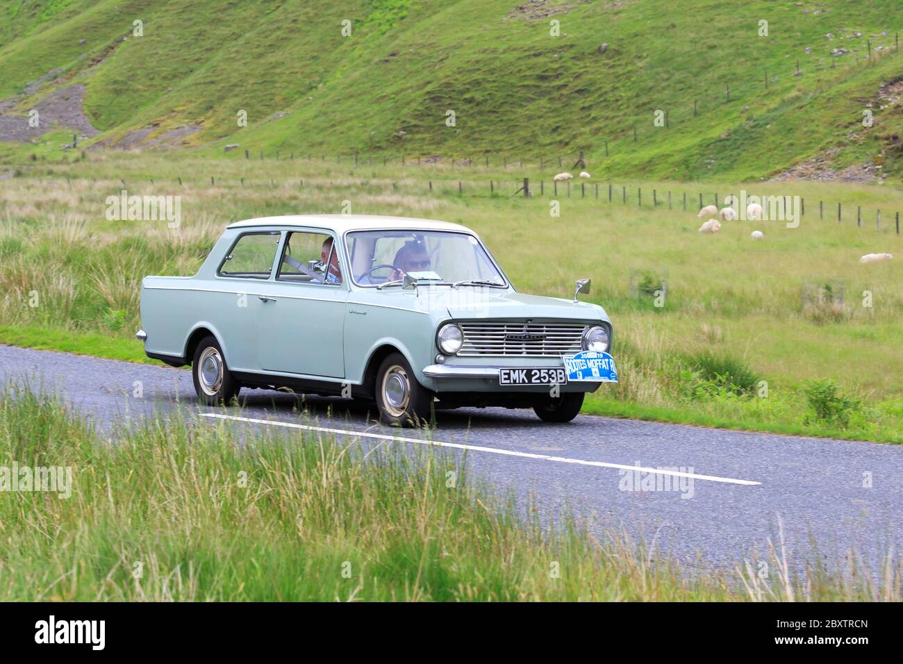 MOFFAT, SCOTLAND - JUNE 29, 2019: 1964 Vauxhall Viva HA Deluxe saloon  car in a classic car rally en route towards the town of Moffat, Dumfries and Ga Stock Photo