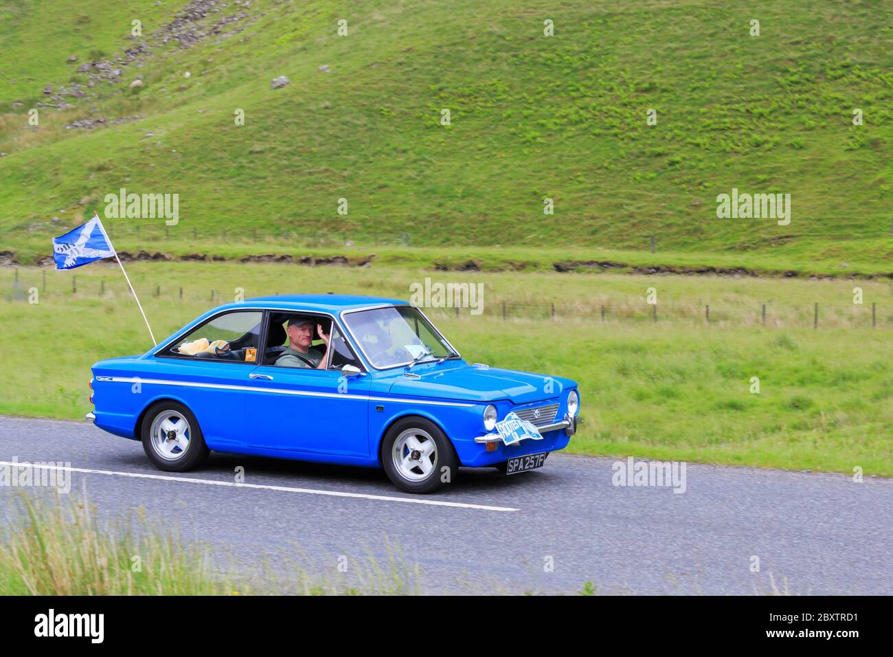 MOFFAT, SCOTLAND JUNE 29, 2019 1967 Singer Chamois Coupe car in a