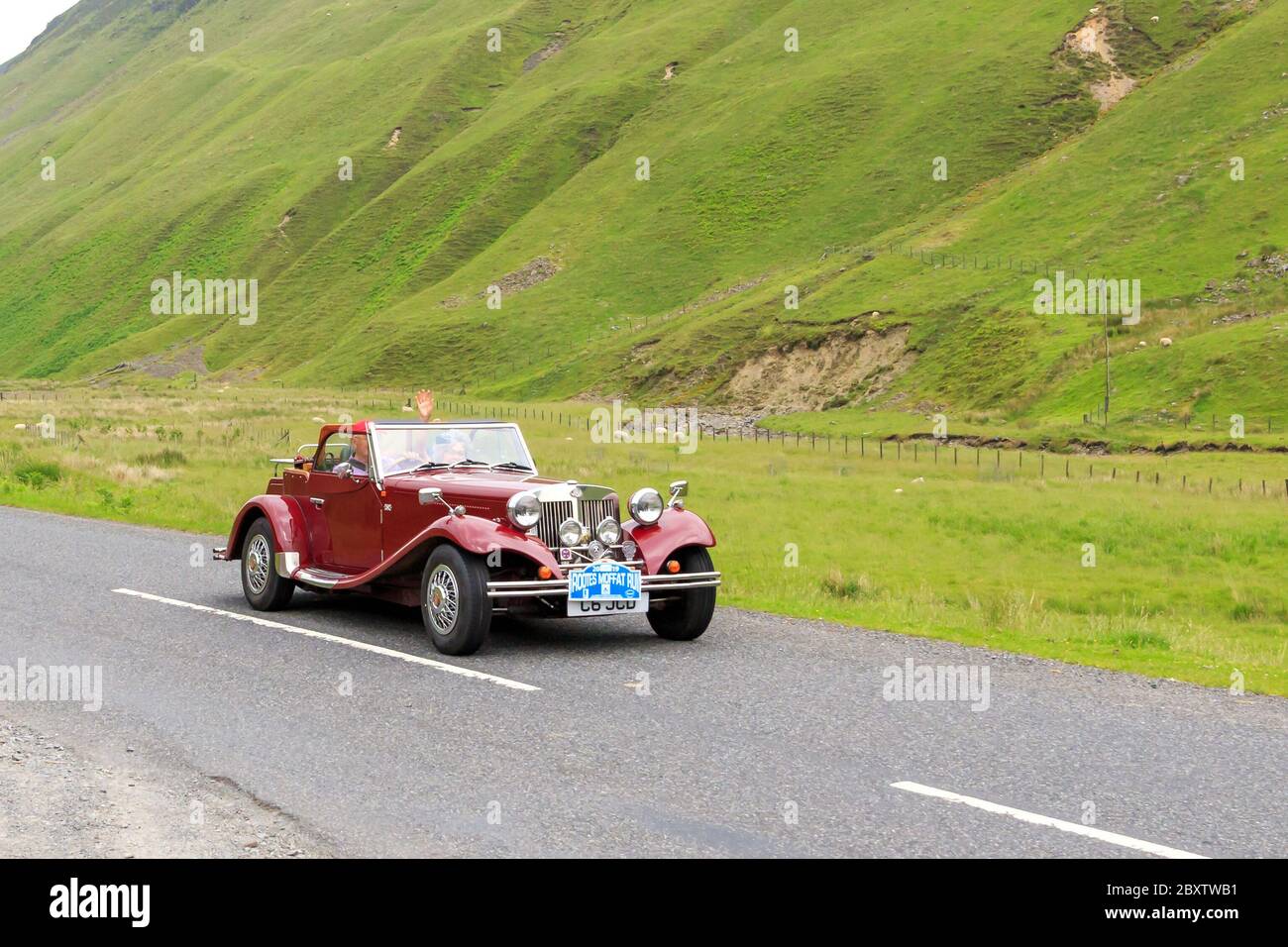 MOFFAT, SCOTLAND - JUNE 29, 2019: JBA Falcon Sports car in a classic car rally en route towards the town of Moffat, Dumfries and Galloway Stock Photo