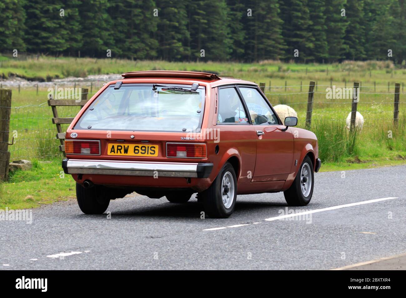 MOFFAT, SCOTLAND - JUNE 29, 2019: 1977 Chrysler Sunbeam car in a classic car rally en route towards the town of Moffat, Dumfries and Galloway Stock Photo