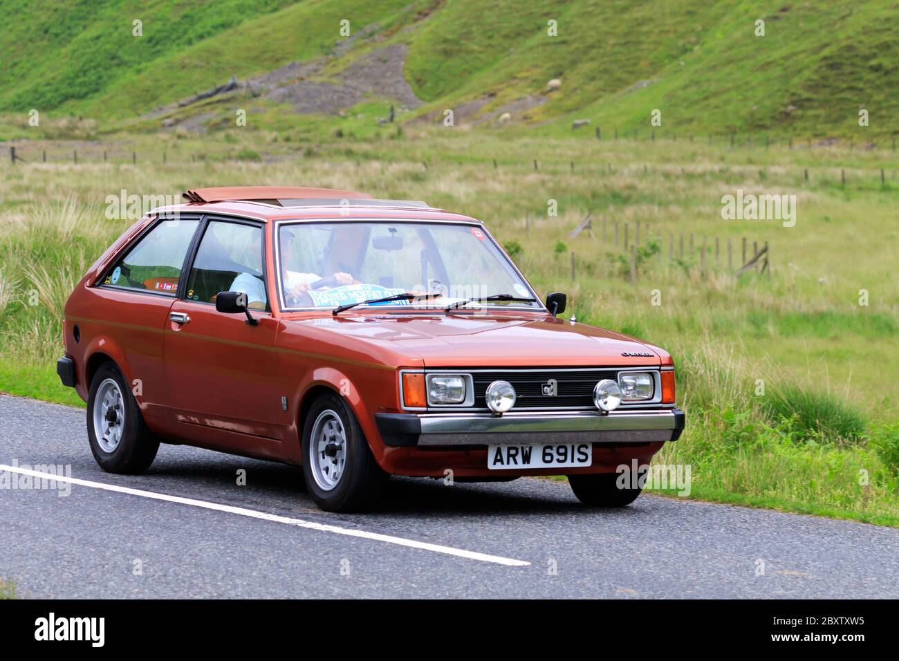 MOFFAT, SCOTLAND - JUNE 29, 2019: 1977 Chrysler Sunbeam car in a classic car rally en route towards the town of Moffat, Dumfries and Galloway Stock Photo