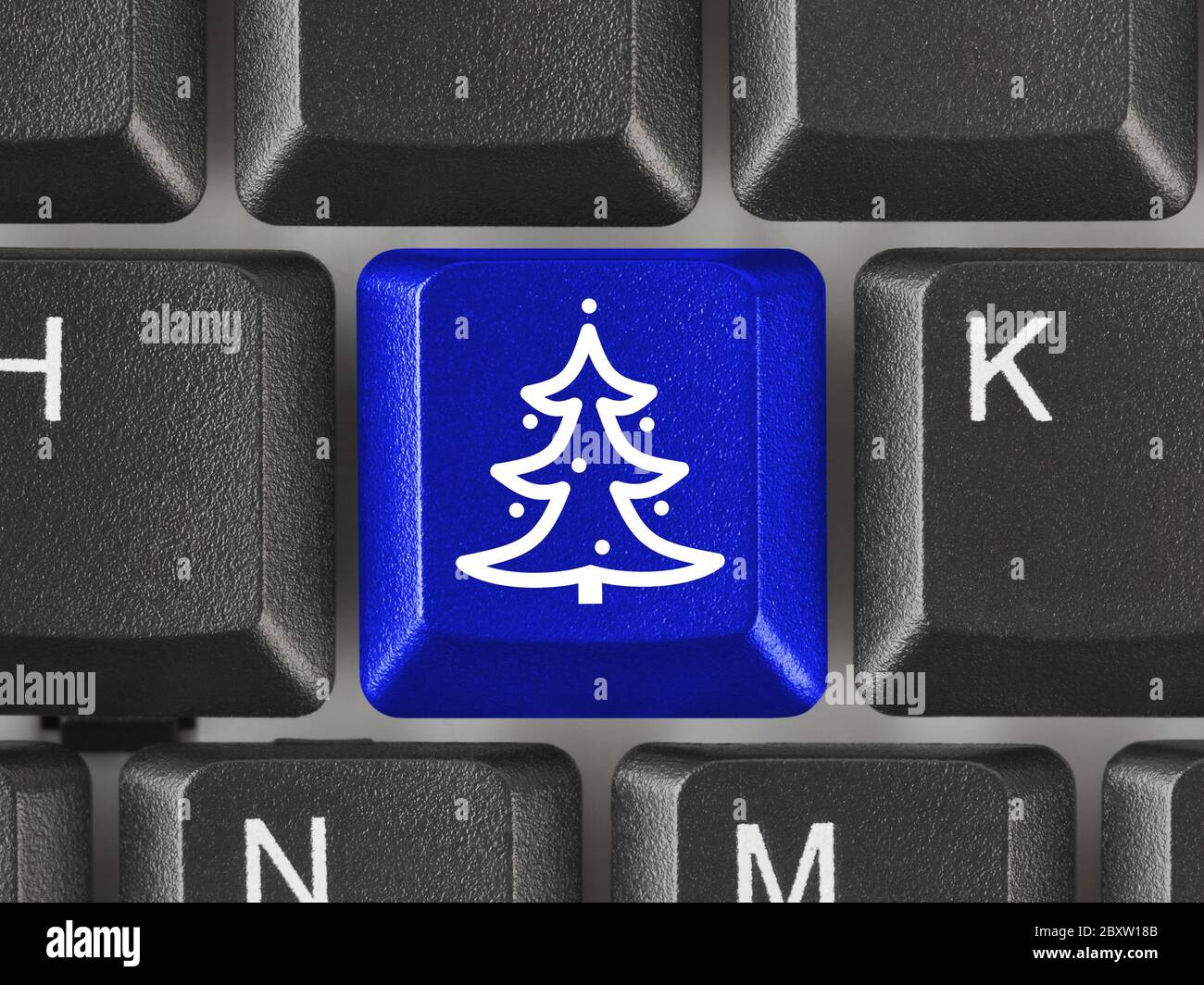 Computer keyboard with Christmas tree key Stock Photo - Alamy