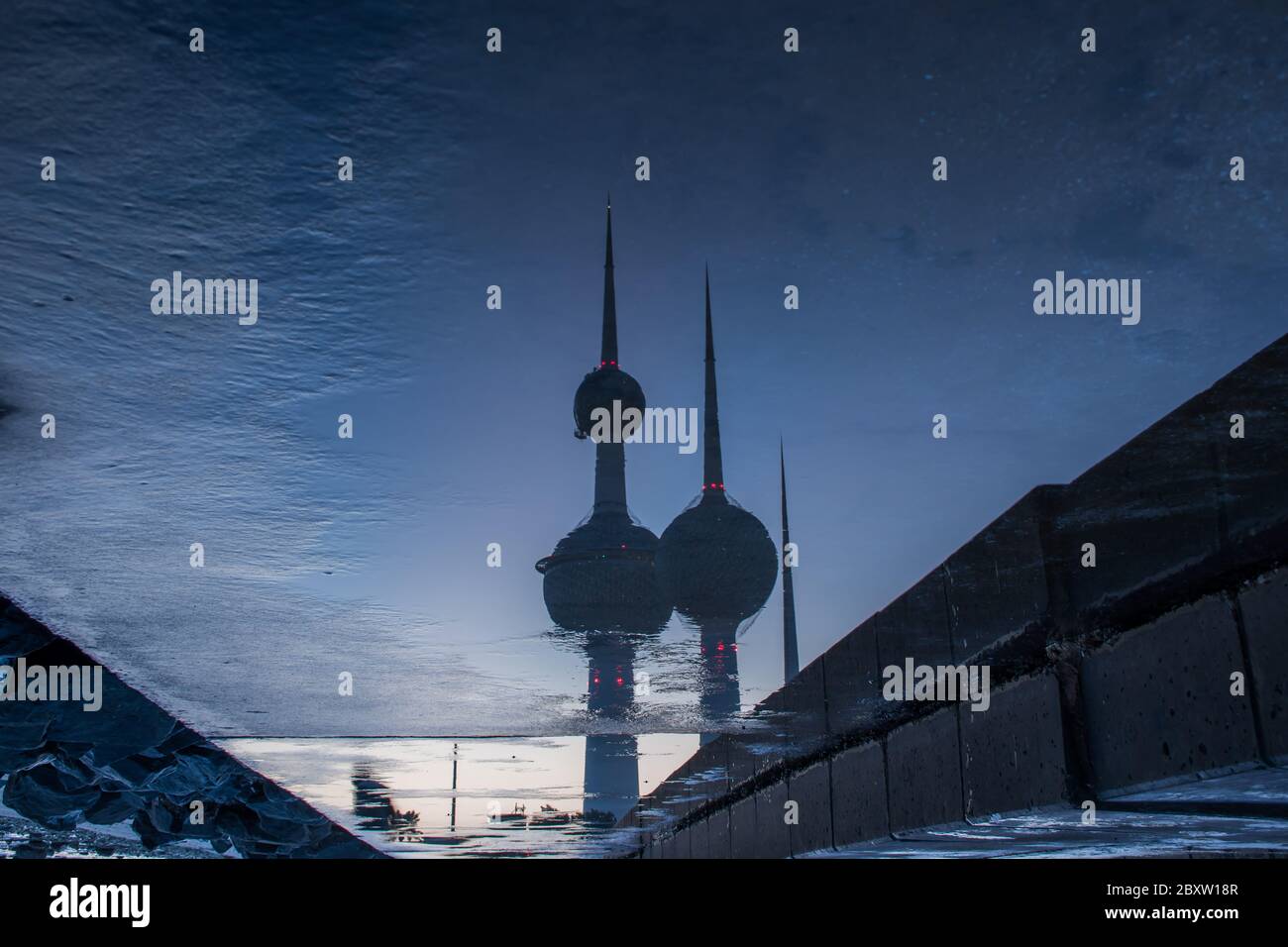 Water reflection of Kuwait Towers creating abstract art on a early morning in Kuwait City Stock Photo