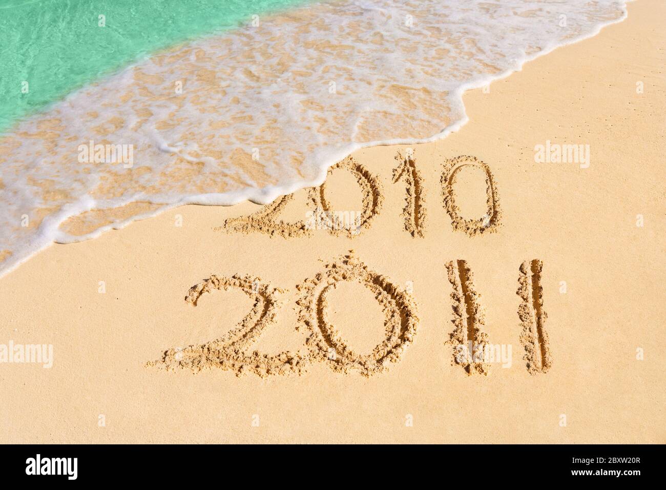 Numbers on beach 2011 Stock Photo - Alamy