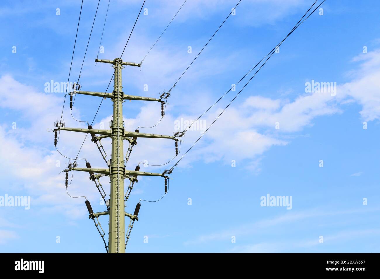 Power pole with electric wires. Industry tools Stock Photo