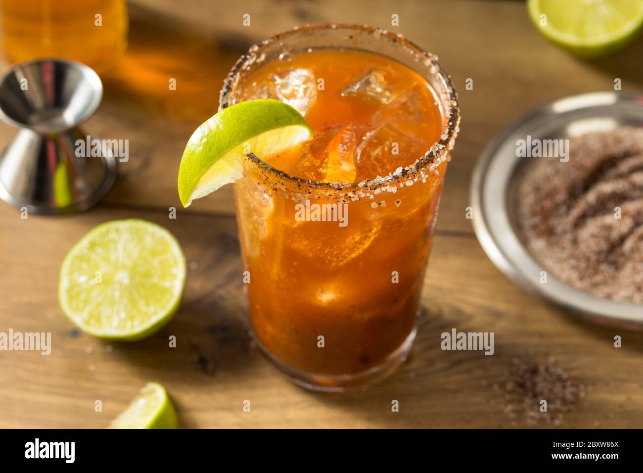 Homemade Mexican Michelada Beer Cocktail with Lime Stock Photo