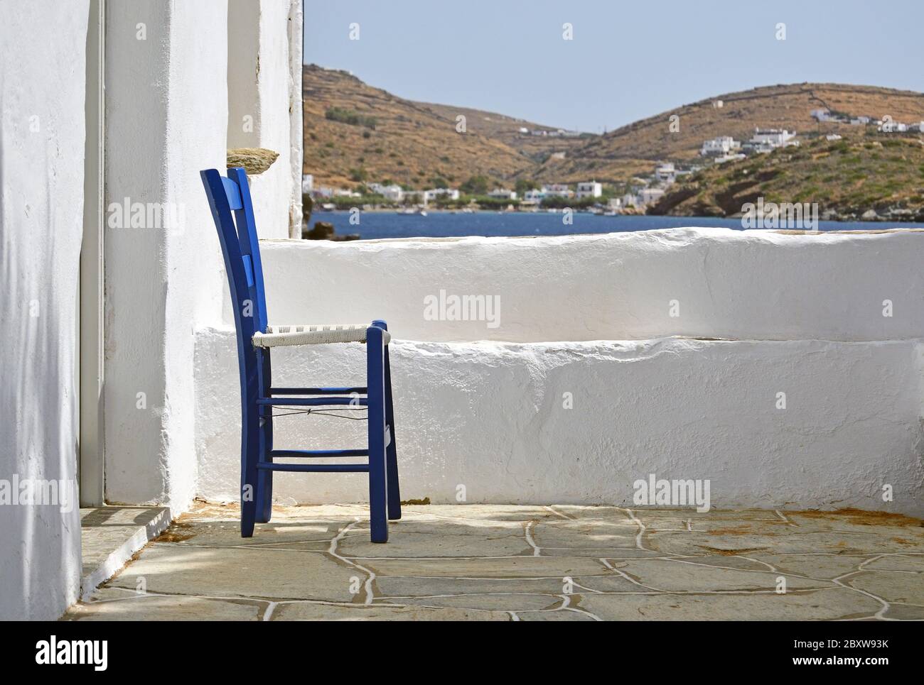 Traditional greek chair on island background Stock Photo