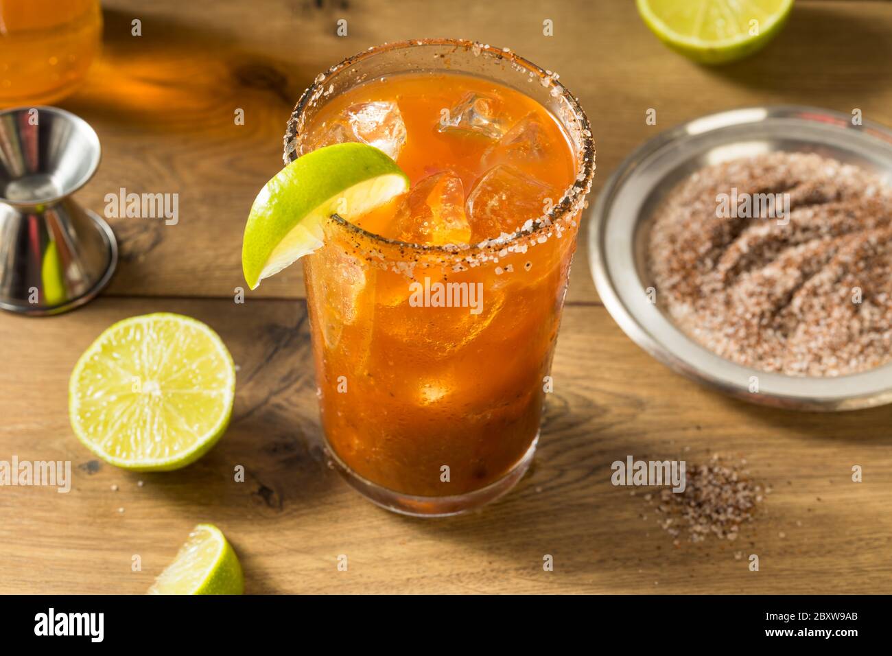 Homemade Mexican Michelada Beer Cocktail with Lime Stock Photo