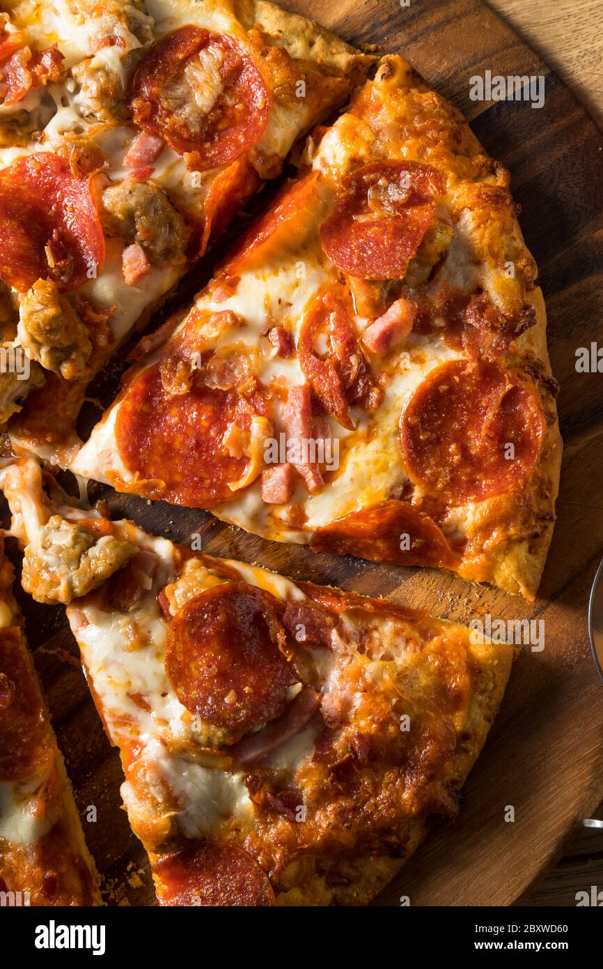 Savory Homemade Meat Lovers Pizza with Pepperoni and Bacon Stock Photo Alamy