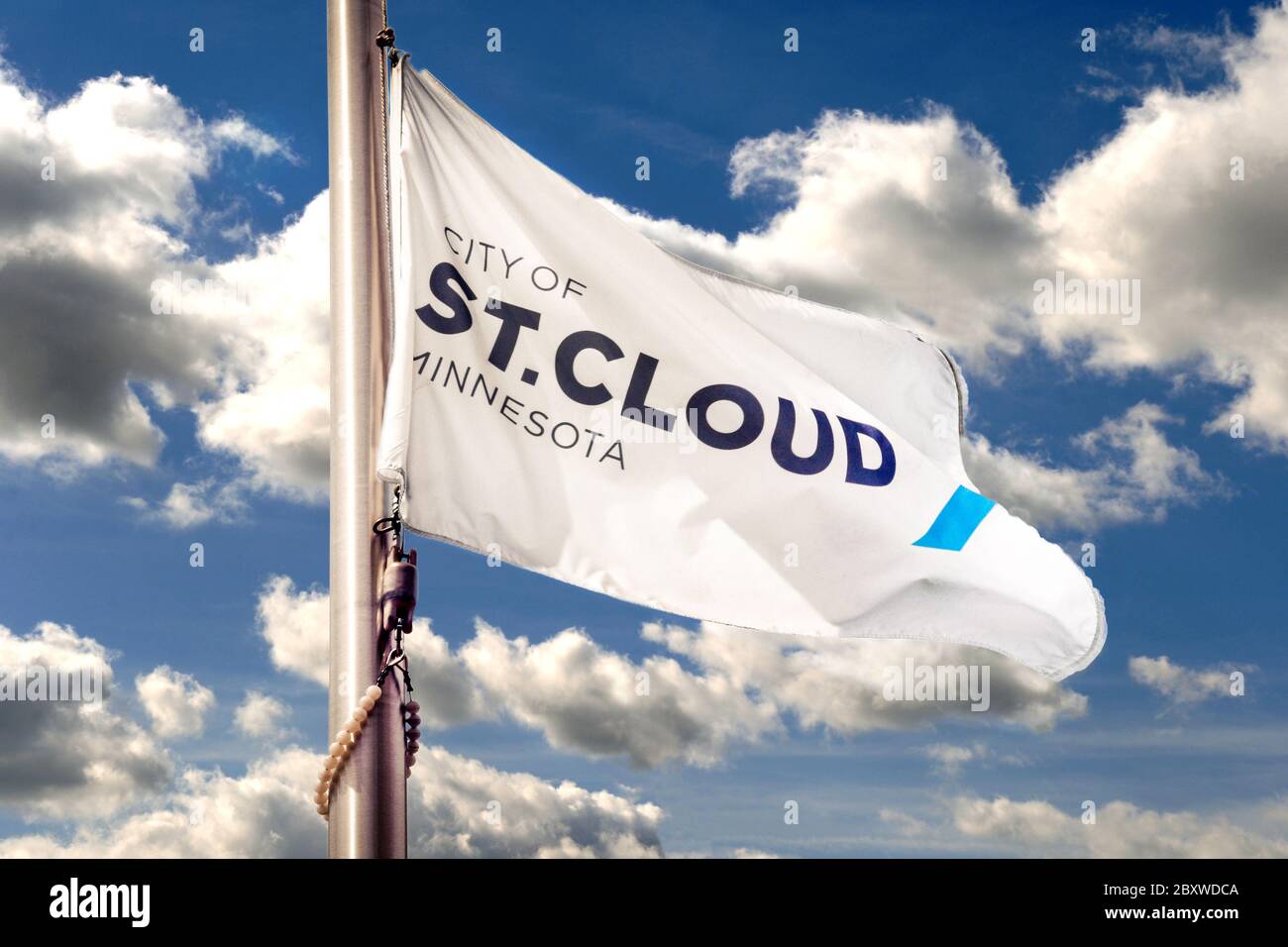 The City of St. Cloud, Minnesota logo on a white flag hoisted up a flag