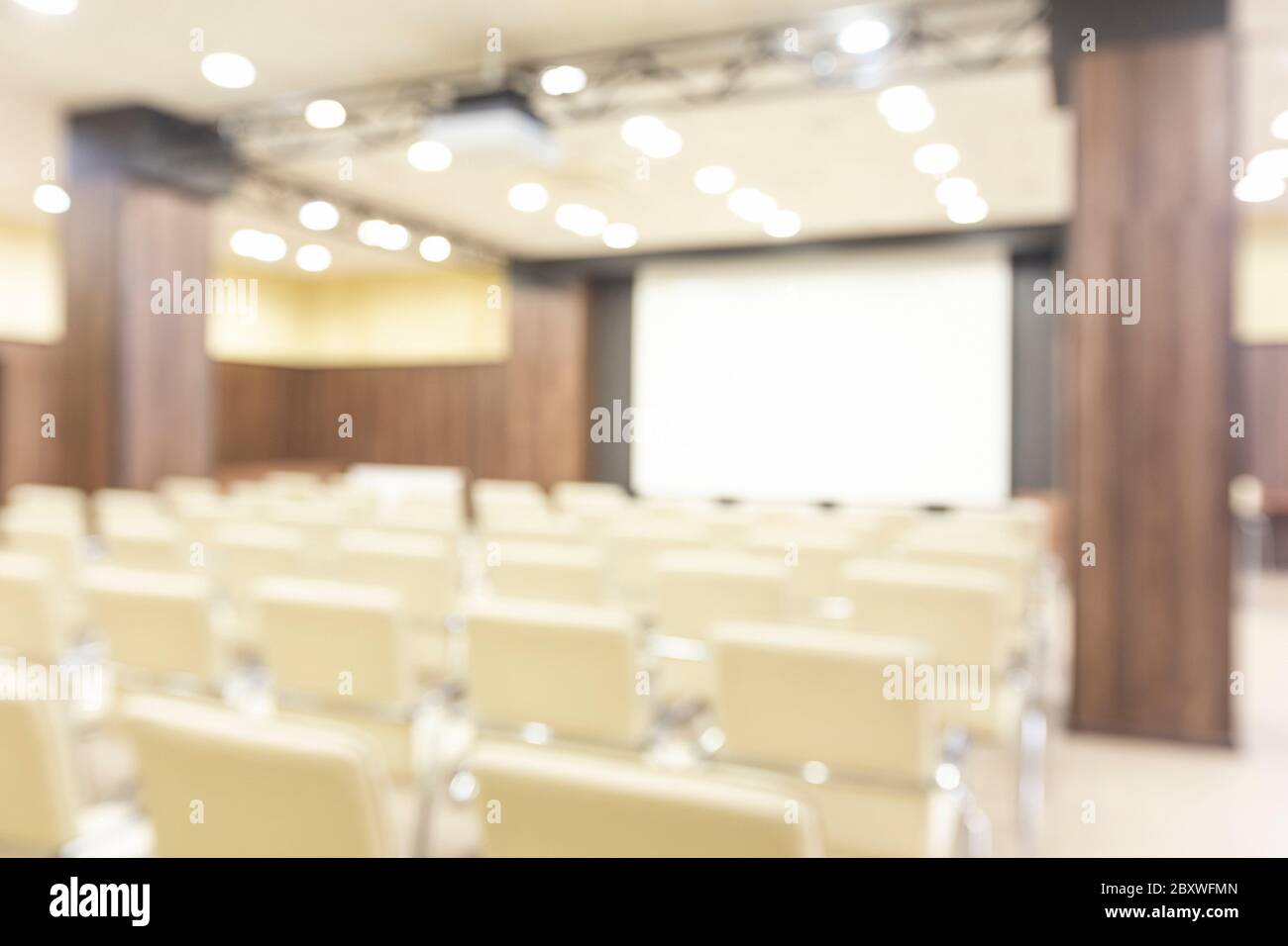 Blurred photo of conference room from projector screen Stock Photo Alamy