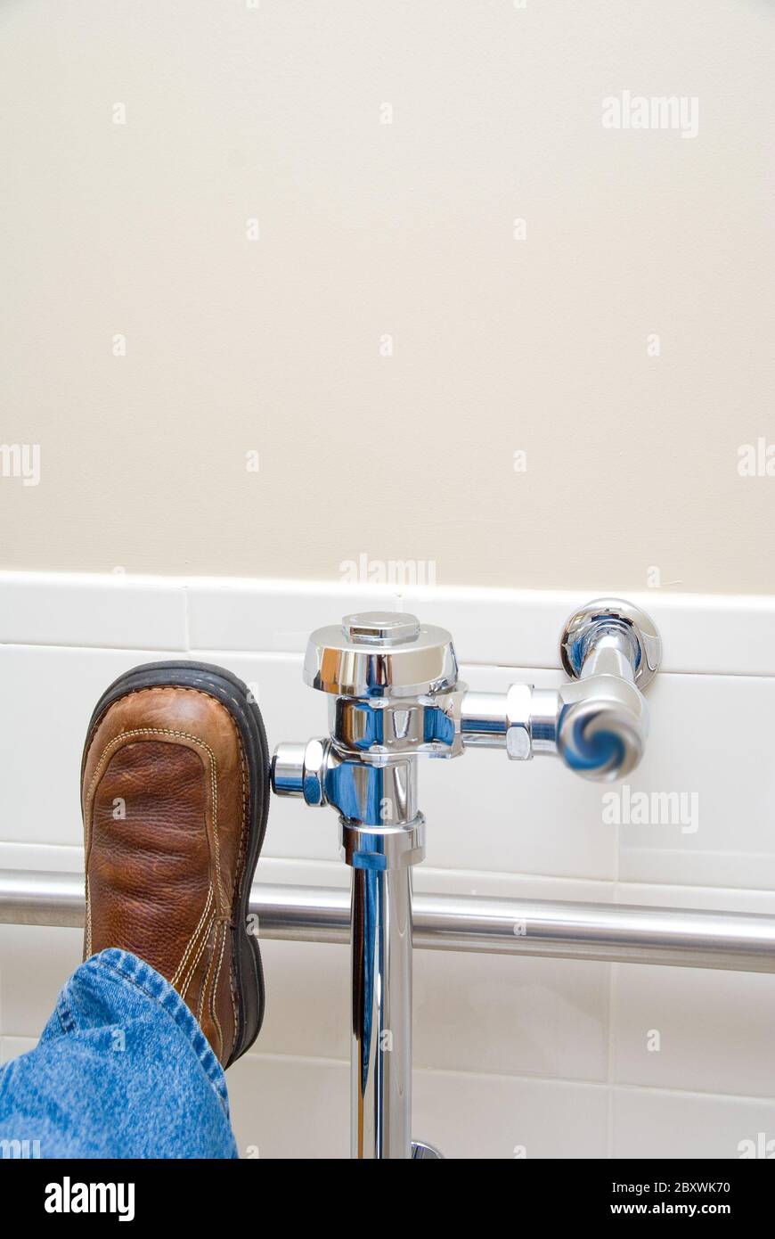 Flush toilet with foot hires stock photography and images Alamy
