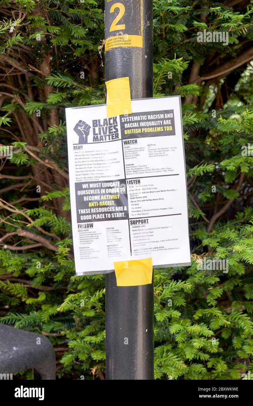 Black Lives Matter information flyer taped to a metal post Stock Photo