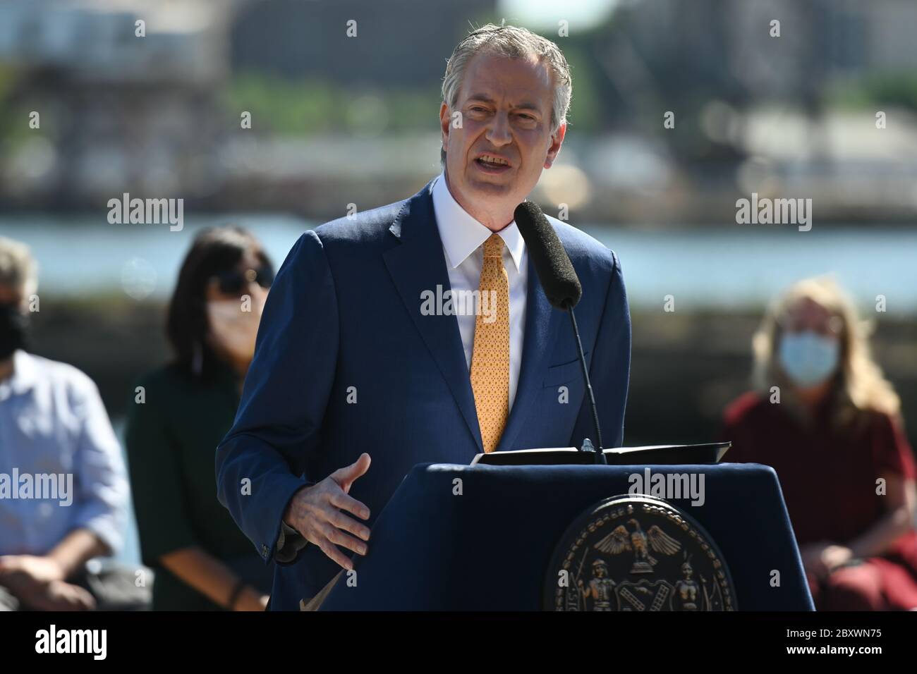 Mayor Bill de Blasio announces the Phase One re-opening of New York City at the Brooklyn Navy Yard on June 8, 2020. Phase One allows for manufacturing Stock Photo