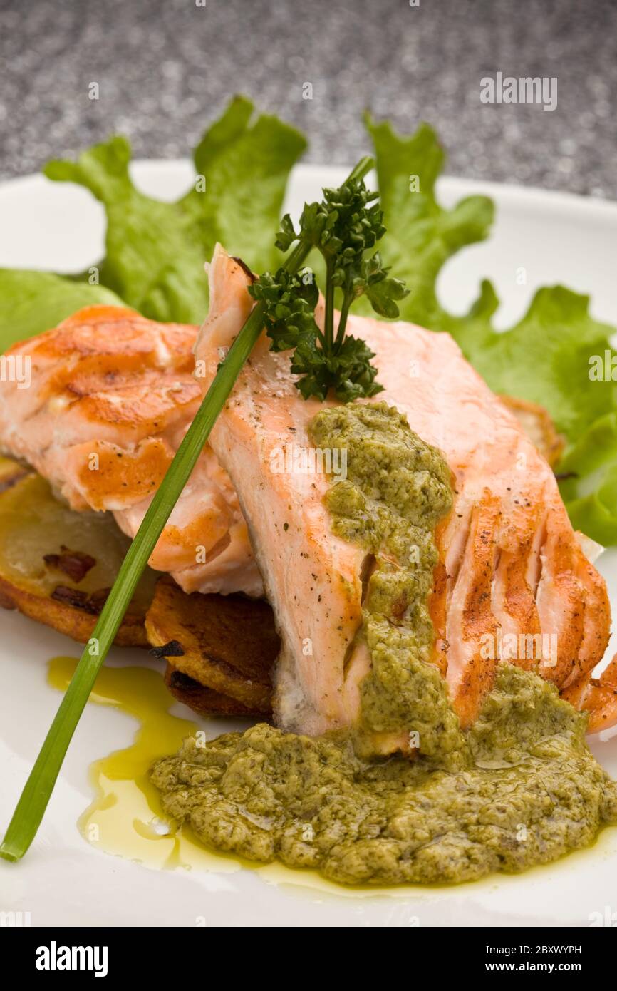 Grilled Salmon with Basil sauce Stock Photo - Alamy