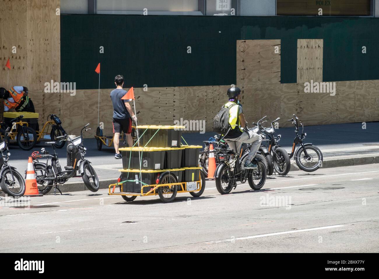 Whole Foods Market employs Carla Cargo trailer with ebike for food delivery in Midtown