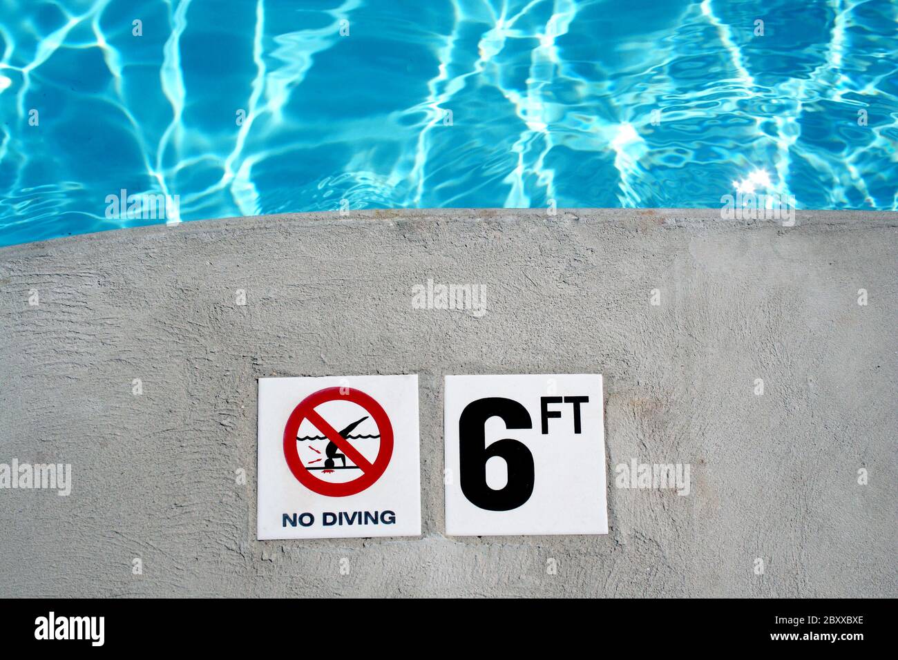 an image of a Swimming pool depth marker Stock Photo