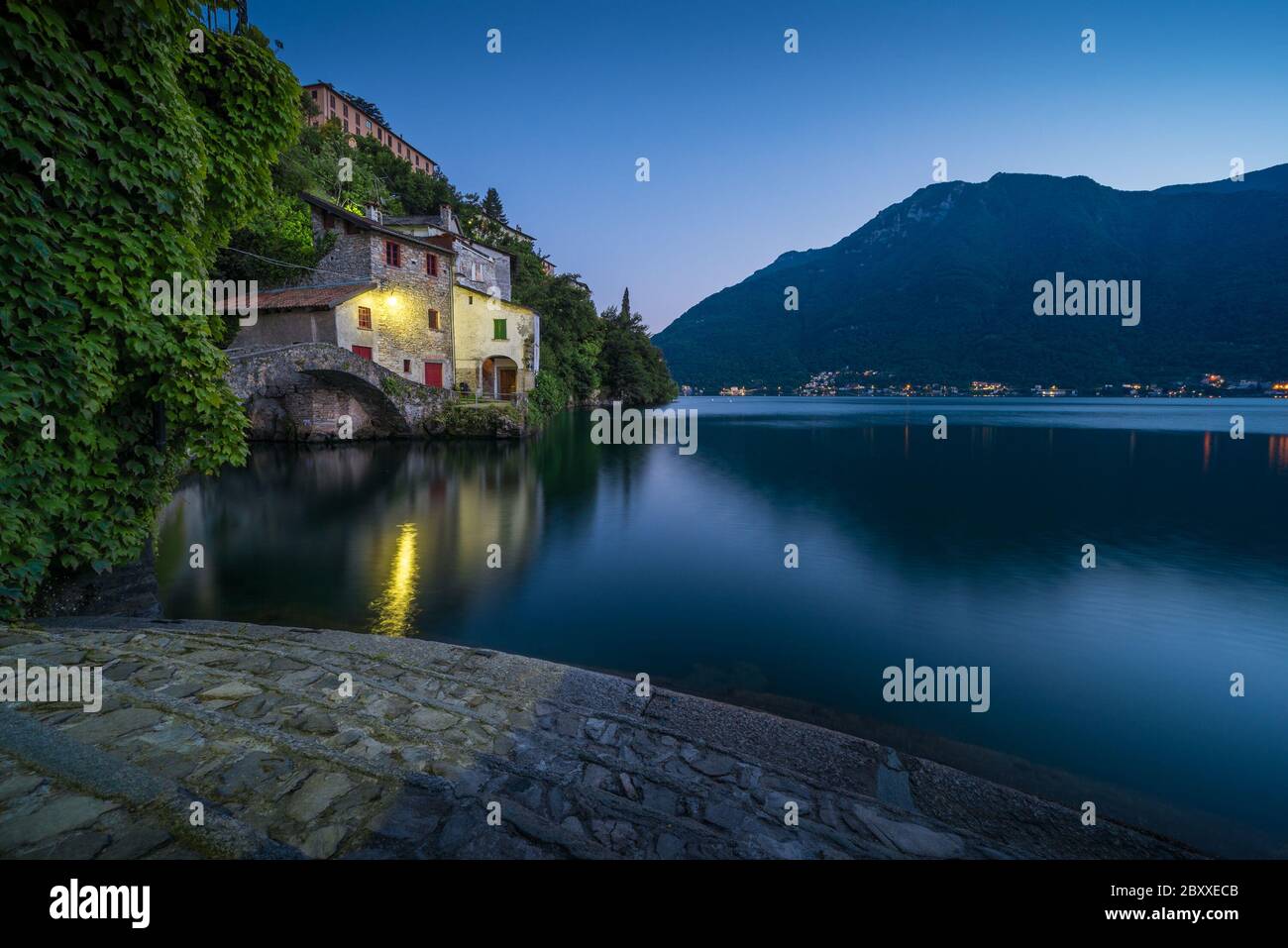 Scenic picture of Nesso on the Como lake in Italy with stone foreground
