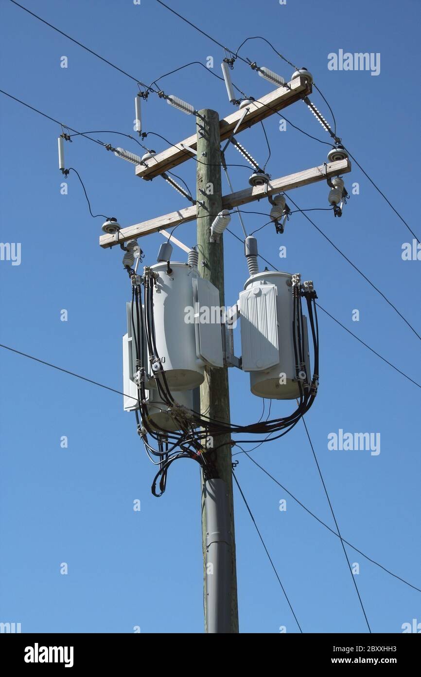 A Telephone pole with three transformers Stock Photo Alamy