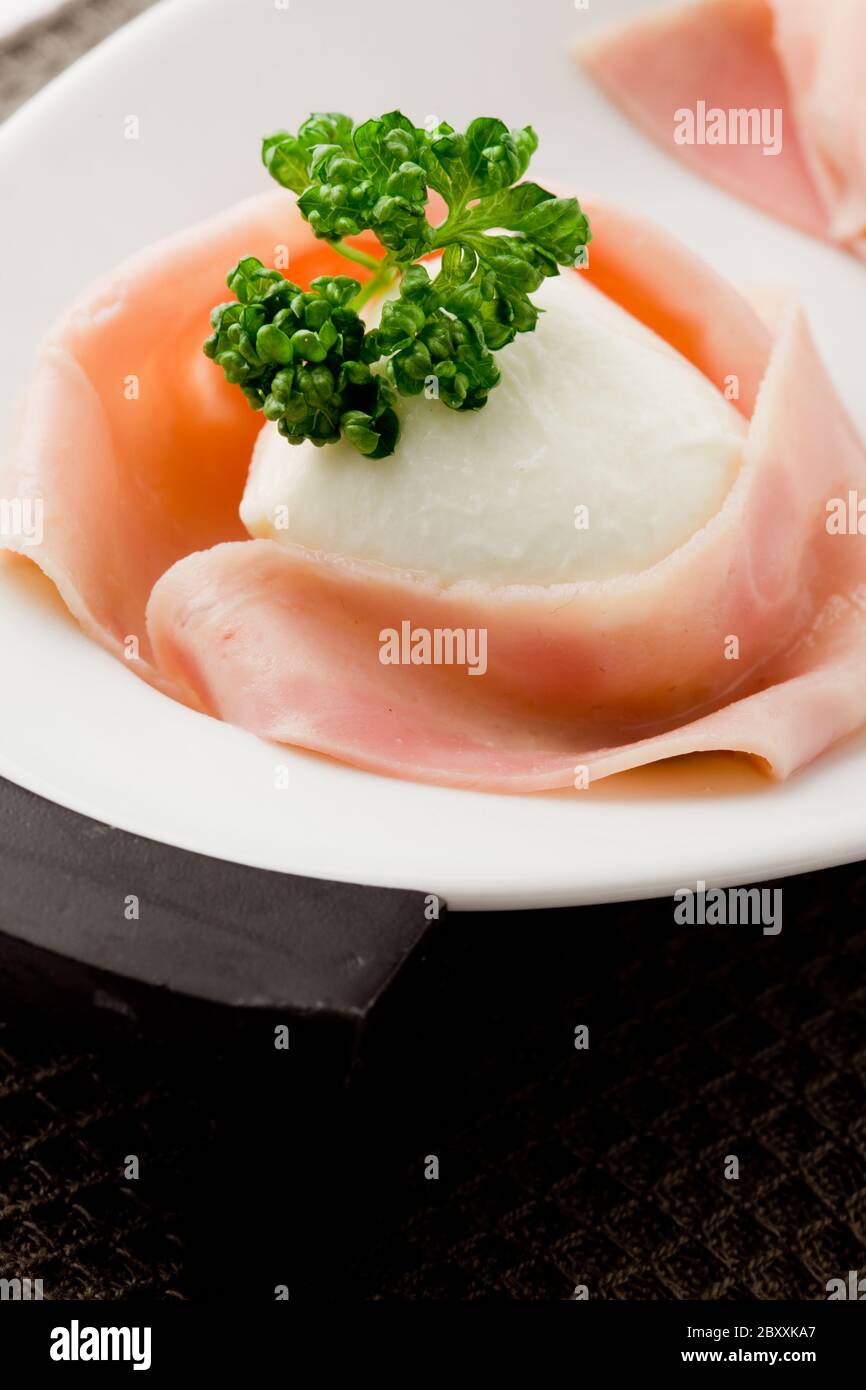 Mozzarella with wrapped ham Stock Photo Alamy