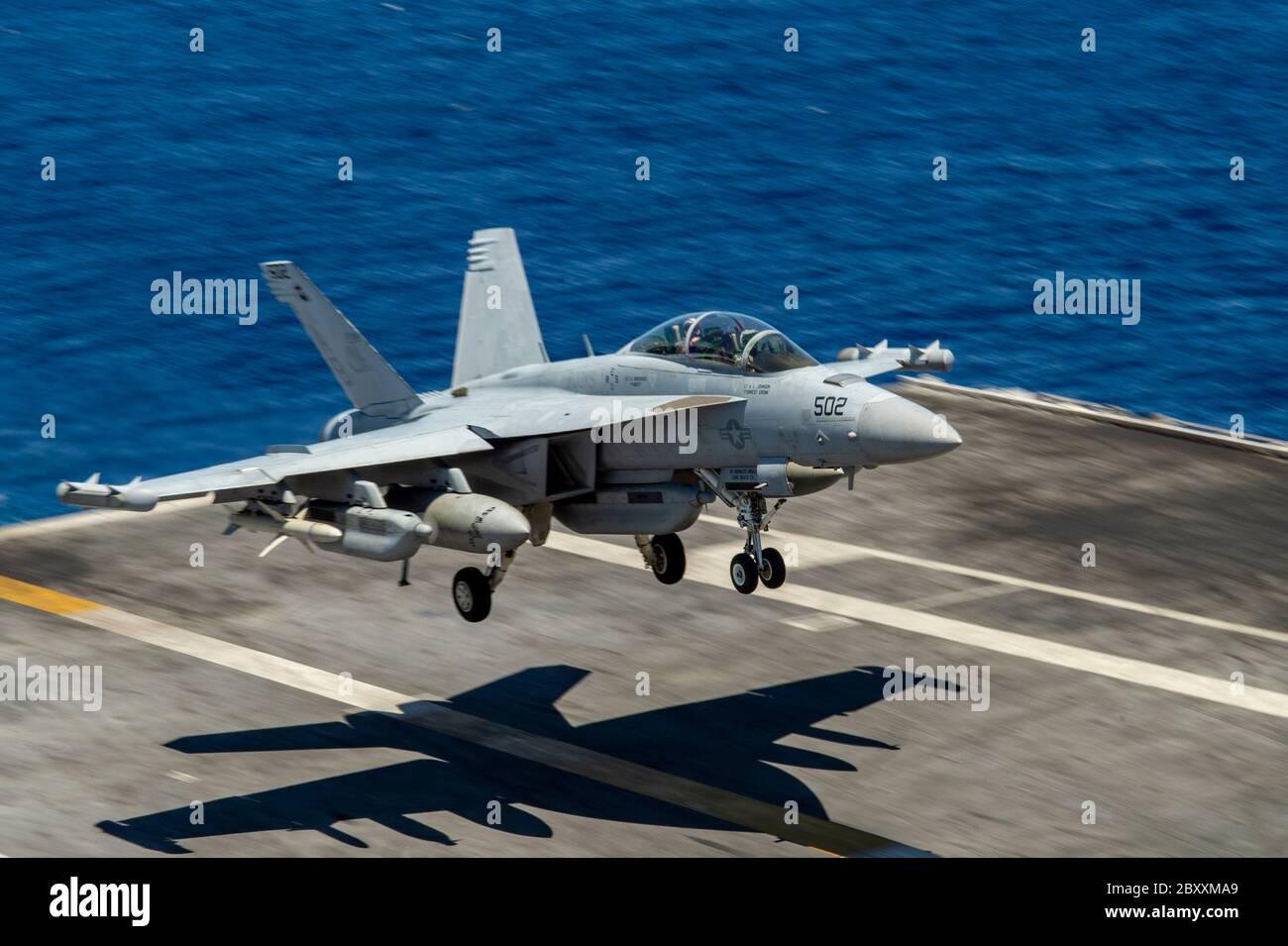 A U.S. Navy EA-18G Growler fighter aircraft assigned to the Rooks of Electronic Attack Squadron 137 lands on the flight deck of the Nimitz-class aircraft carrier USS Harry S. Truman June 2, 2020 operating in the Atlantic Ocean. Stock Photo