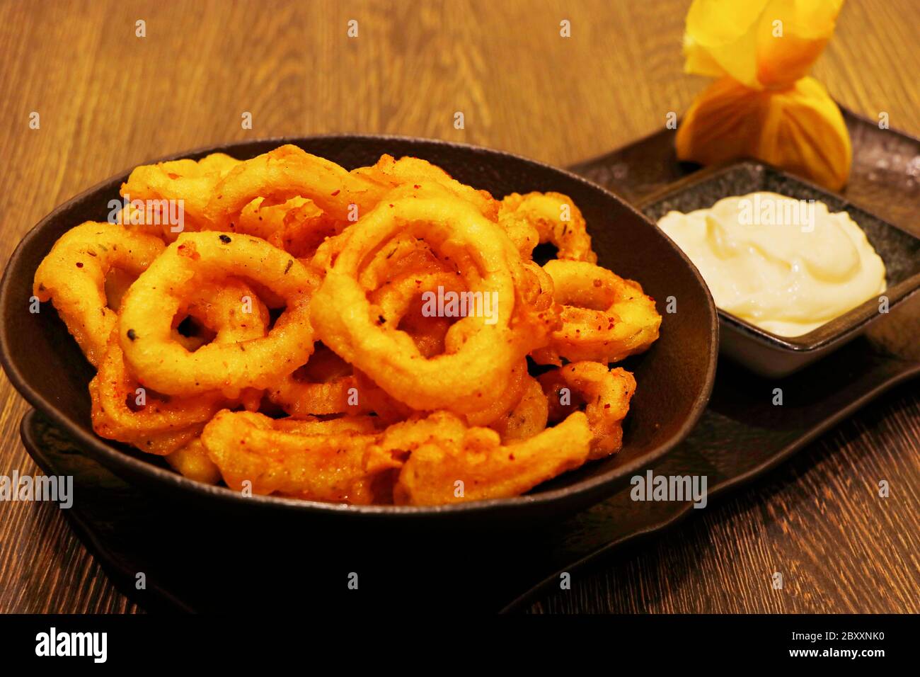crispy battered fried calamari rings with garlic mayonnaise Stock Photo