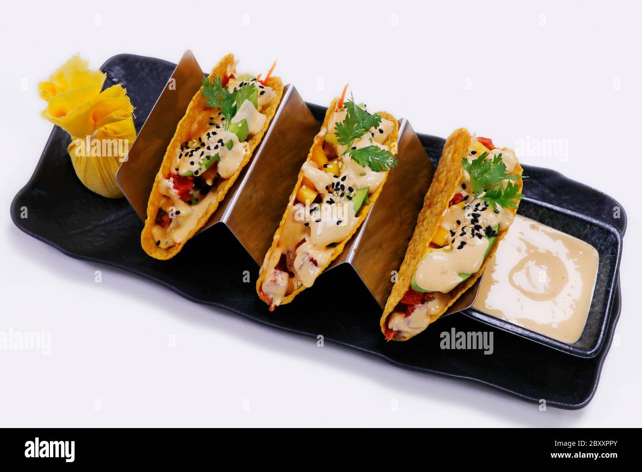 traditional Mexican dish taco,consisting of a small handsized corn or